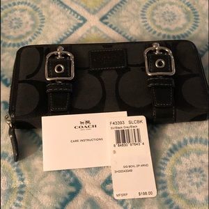 Vintage coach accordion wallet.